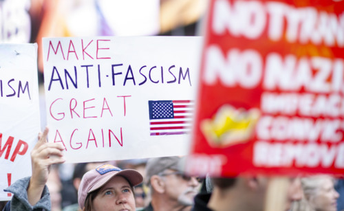 Demonstrators participating in "No Kings" Protest March, Times Square, Manhattan, New York City,