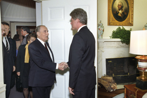 U.S. President Bill Clinton greeting French President François Mitterrand of France as he arrives