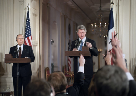 U.S. President Bill Clinton and French President François Mitterrand giving press statements in the