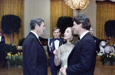 U.S. President Ronald Reagan with Arkansas Governor Bill Clinton and his wife Hillary Clinton at a