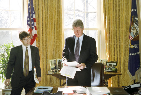 U.S. President Bill Clinton meeting with White House Communications Director George Stephanopoulos