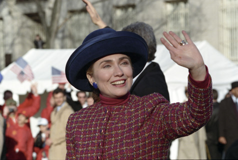 U.S. First Lady Hillary Rodham Clinton  and U.S. President Bill Clinton (partially hidden) walking