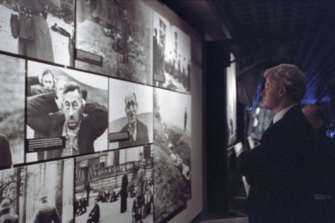 U.S. President Bill Clinton viewing photo exhibit at the Holocaust Museum, Washington, D.C., USA,