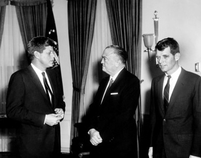 U.S. President John F. Kennedy with U.S. Attorney General Robert Kennedy (right) and FBI Director J