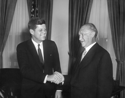 U.S. President John F. Kennedy shaking hands with West German Chancelor Konrad Adenauer in the oval