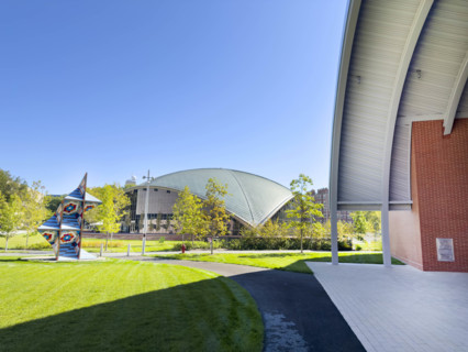 Edward and Joyce Linde Music Building (partial foreground), Kresge Auditorium (background),