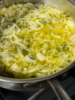 Sauteed onions and scallions in frying pan