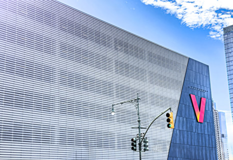 Verizon office building, building exterior with street and traffic lights, 12th Avenue and West