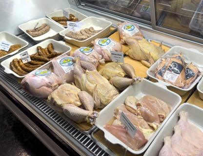Raw chicken and sausages display case, Dickson's Farmstand Meats, Chelsea Market, Chelsea,