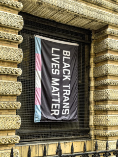 Black Trans Lives Matter banner hanging from building exterior, Greenwich Village, Manhattan, New