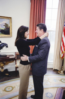 U.S. President Ronald Reagan with his daughter Patti Davis in the Oval Office of the White House,