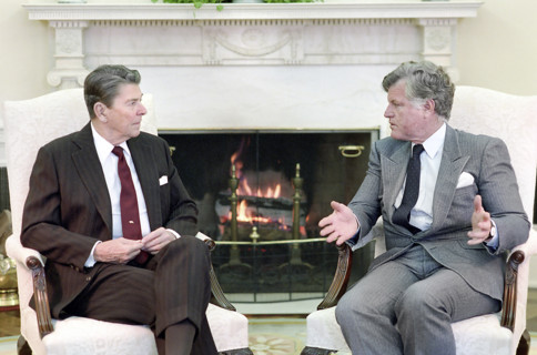 U.S. President Ronald Reagan meeting with U.S. Senator Edward "Ted" Kennedy in Oval Office, White