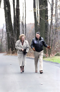 U.S. President Ronald Reagan walking with British Prime Minister Margaret Thatcher at Camp David,