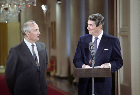 U.S. President Ronald Reagan and Soviet General Secretary Mikhail Gorbachev at podium during