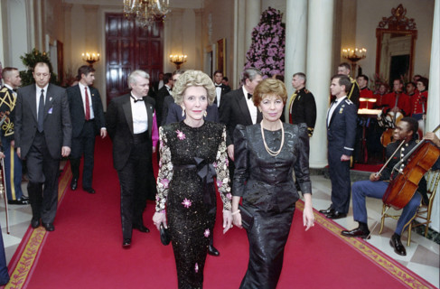 U.S. First Lady Nancy Reagan walking with First Lady of the Soviet Union Raisa Gorbachev in White