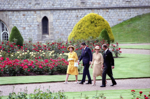 U.S. President Ronald Reagan (2nd left)  and U.S. First Lady Nancy Reagan (2nd right) walking with