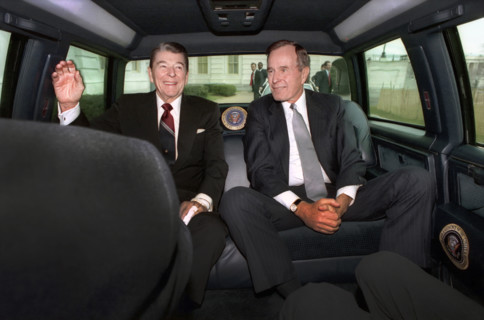 U.S. President Ronald Reagan and U.S. President-elect George H.W. Bush traveling via limousine to