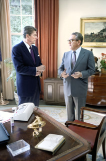 U.S. President Ronald Reagan meeting with former U.S. Secretary of State Henry Kissinger in White