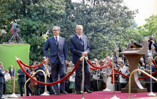 U.S. President Gerald R. Ford and Shah Mohammad Reza Pahlavi of Iran on podium during state arrival
