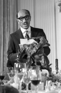 President Anwar Sadat of Egypt delivering a toast at White House state dinner held in his honor,