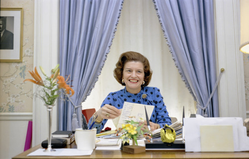 U.S. First Lady Betty Ford reading letters in her White House East Wing office, Washington, D.C.,