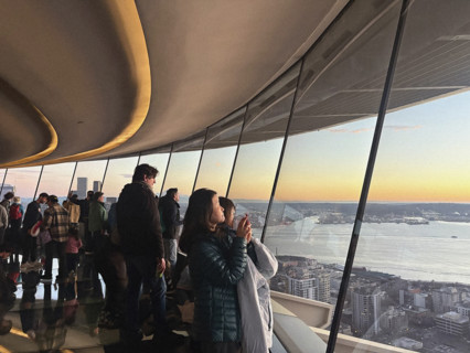 Group of tourists admiring view from observation deck, Space Needle, Seattle, Washington, USA