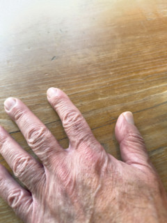 Mature adult man's hand