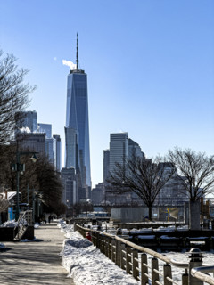 One World Trade Center and cityscape of Financial District in winter viewed from Hudson River Park,