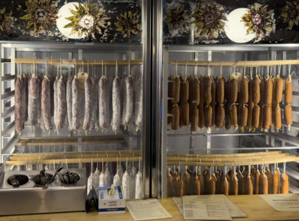 Dried meats hanging in display case, Dickson's Farmstand Meats, Chelsea Market, Chelsea, Manhattan,
