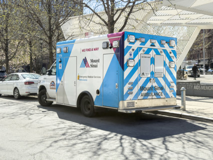 Mount Sinai Hospital EMS ambulance parked on urban street, Chelsea, Manhattan, New York City, New