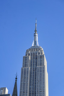 Empire State Building against blue sky, Manhattan, New York City, New York, USA