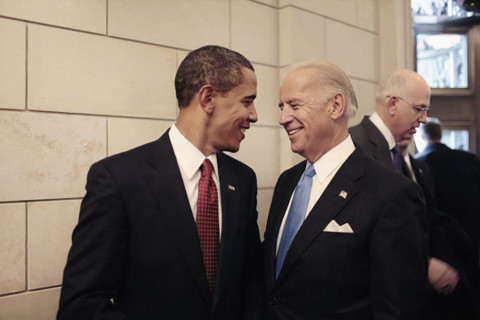 U.S. President Barack Obama  talking with U.S. Vice President Joe Biden after departure of former U