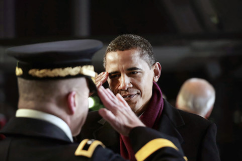 U.S. President Barack Obama saluting military officer during Inaugural Parade ceremonies,