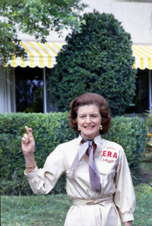 U.S. First Lady Betty Ford crossing her fingers in support of the Equal Rights Amendment,