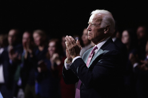 U.S. Vice President Joseph Biden clapping as U.S. President Barack Obama delivers his farewell