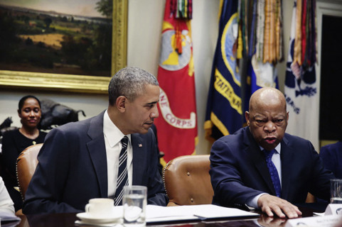 U.S. President Barack Obama with U.S. Congressman John Lewis during meeting with civil rights