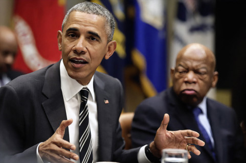 U.S. President Barack Obama with U.S. Congressman John Lewis during meeting with civil rights