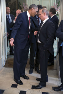 U.S. President Barack Obama talking with President Vladimir Putin of the Russian Federation, after
