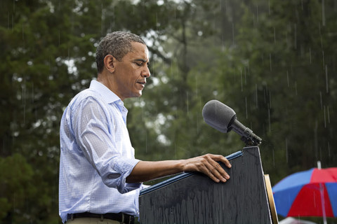 U.S. President Barack Obama delivering remarks in rain at grassroots campaign event, Walkerton