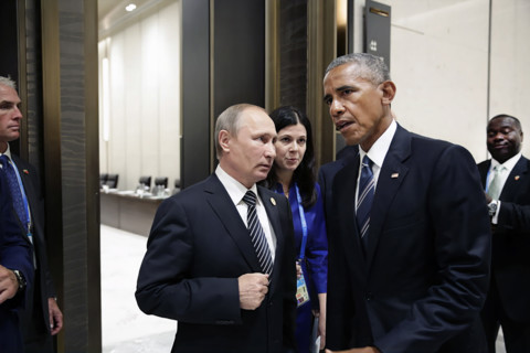 U.S. President Barack Obama talking with President Vladimir Putin of Russia following their meeting