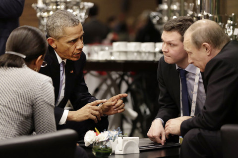 U.S. President Obama meeting privately with President Vladimir Putin of Russia during the G20