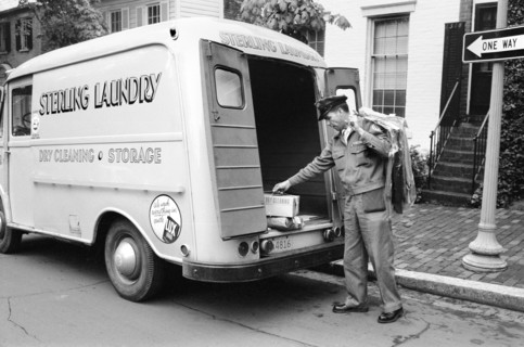 Laundry man from Sterling Laundry, making deliveries with a truck to homes, Washington, D.C., USA,
