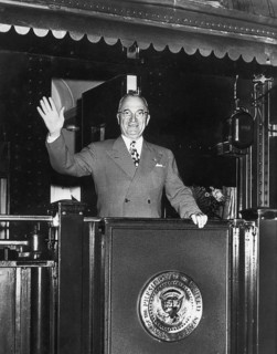 U.S. President Harry S. Truman waving from rear platform of train as he begins his 1948