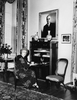 U.S. First Lady Bess Truman seated at her secretary-type desk in Truman living quarters at the