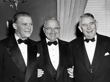 U.S. President Harry S. Truman (center), U.S. Vice President Alben Barkley (right), and