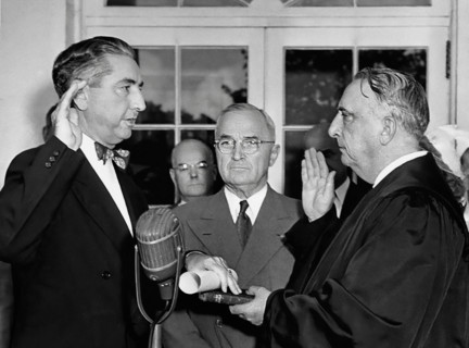 U.S. Chief Justice Fred Vinson (right) swearing in Tom C. Clark (left) as Associate Supreme Court