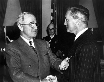 U.S. President Harry S. Truman congratulating U.S. Defense Secretary James Forrestal after awarding