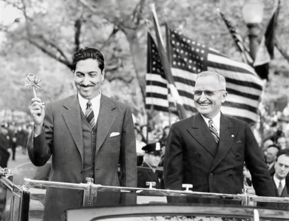 President Miguel Aleman of Mexico (left) holding ceremonial key to city while  U.S. President Harry