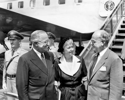 U.S. President Harry S. Truman (left) and U.S. First Lady Bess W. Truman (center) speak with