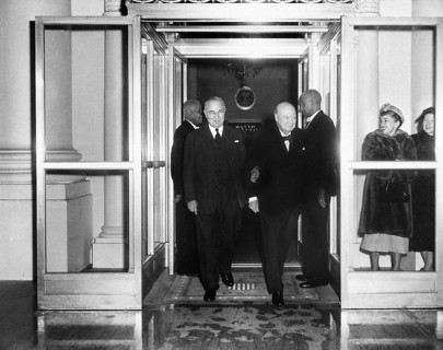 U.S. President Harry S. Truman (left) and British Prime Minister Winston Churchill (right) smile as
